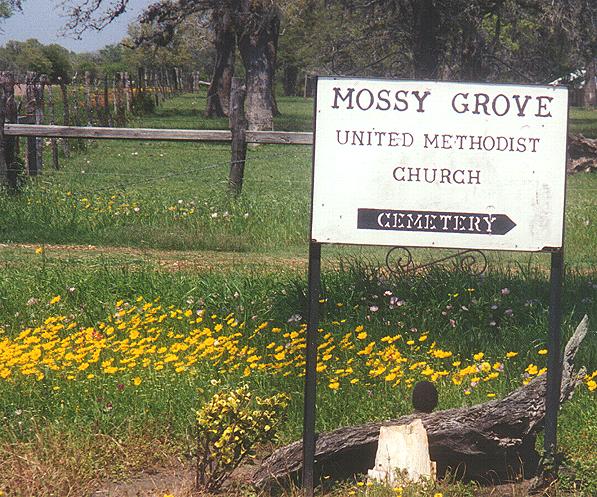 Mossy Grove Sign on Road